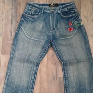 Akademiks Blue Jeans with Red Floral Detail